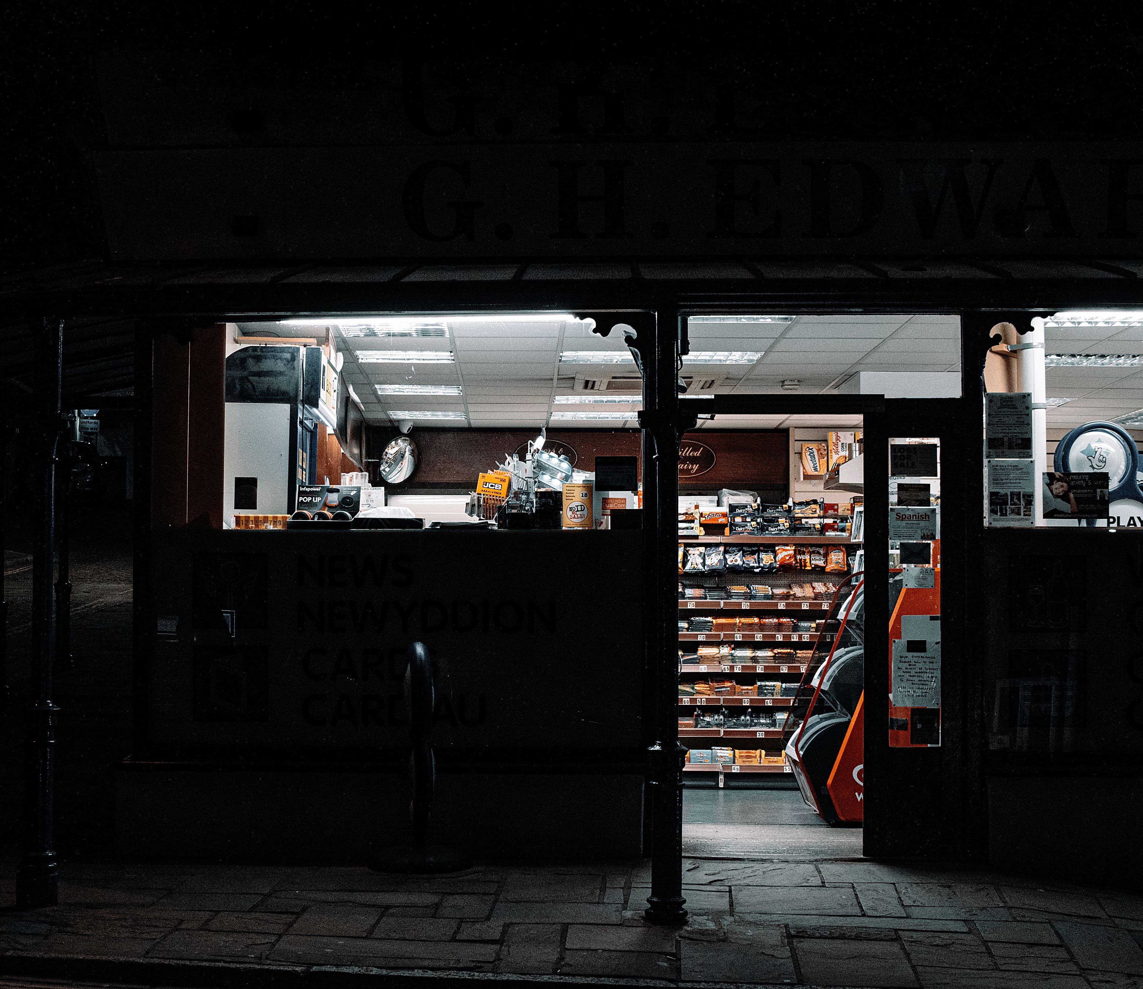 FreshMart convenience store exterior at dusk